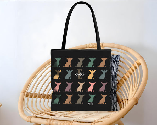 Black tote bag with colorful dog pattern on a name text