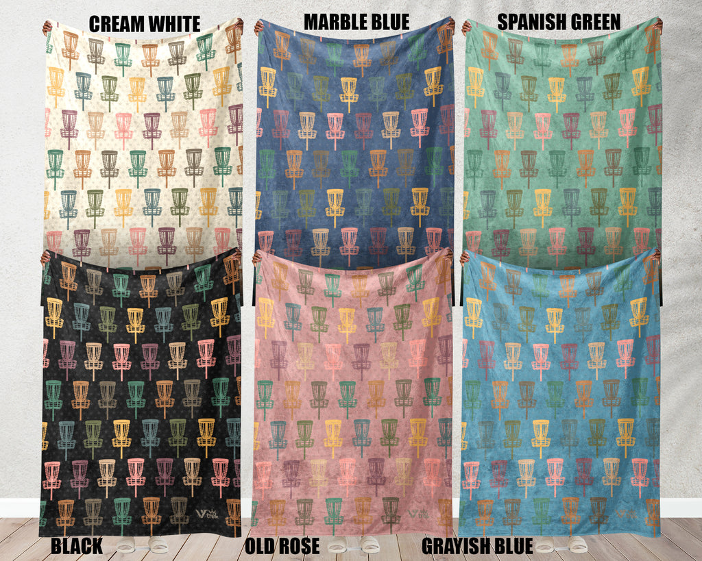 Collection of Disk Golf patterned cloths in various colors surface.