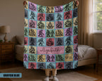 Person holding a colorful blanket with name text printed on it in a bedroom setting.