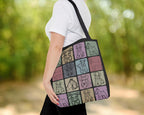 Person holding a tote bag with dog illustrations in a grid pattern outdoors.