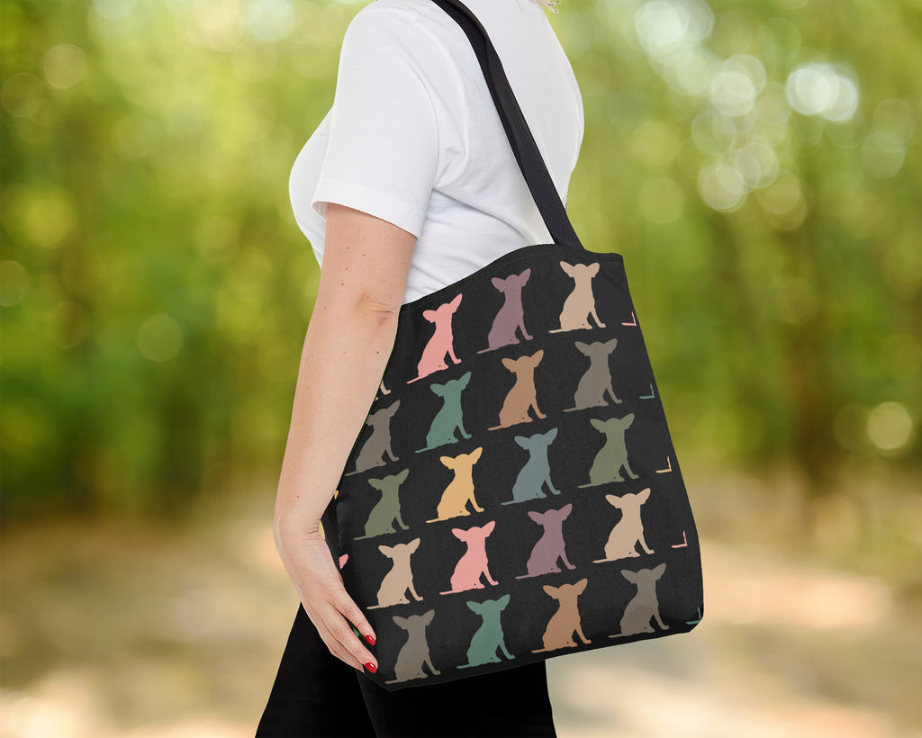 Tote bag with dog pattern held by a person outdoor